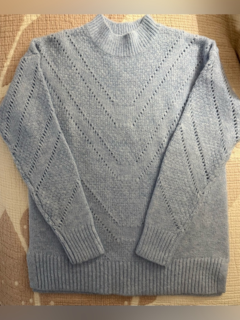 LIGHT BLUE KNIT SWEATER WITH PERFORATION PATTERN FRONT & SLEEVES